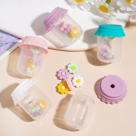 Clear Silicone Shaker Beads with Various Colored Lids and Flowers Embedded Inside the Bottle, Height 27MM