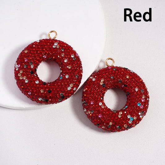 Red beaded earrings on a white background with 'Red' text.

