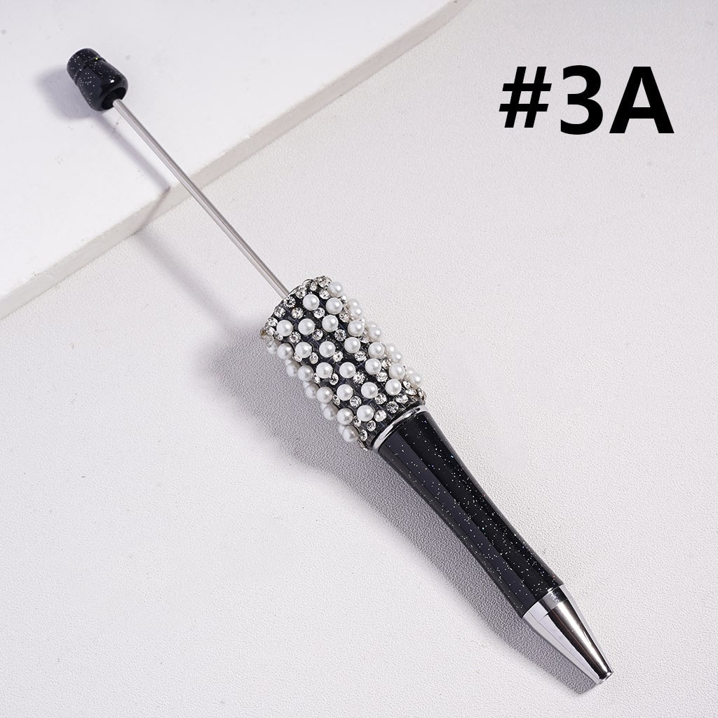 透明なラインストーンと白とカラフルなパールが入った単色のビーズペン