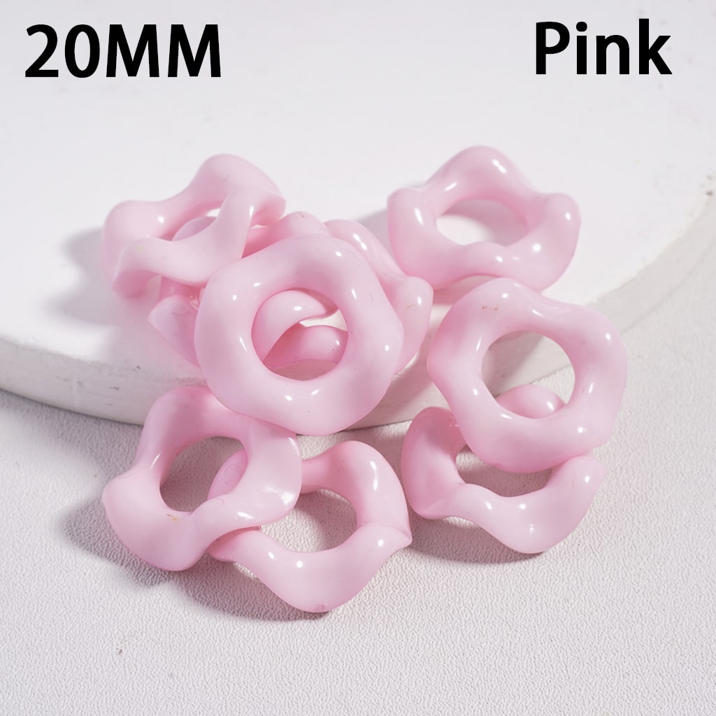 Pink plastic rings with '20MM' and 'Pink' text on a white background

