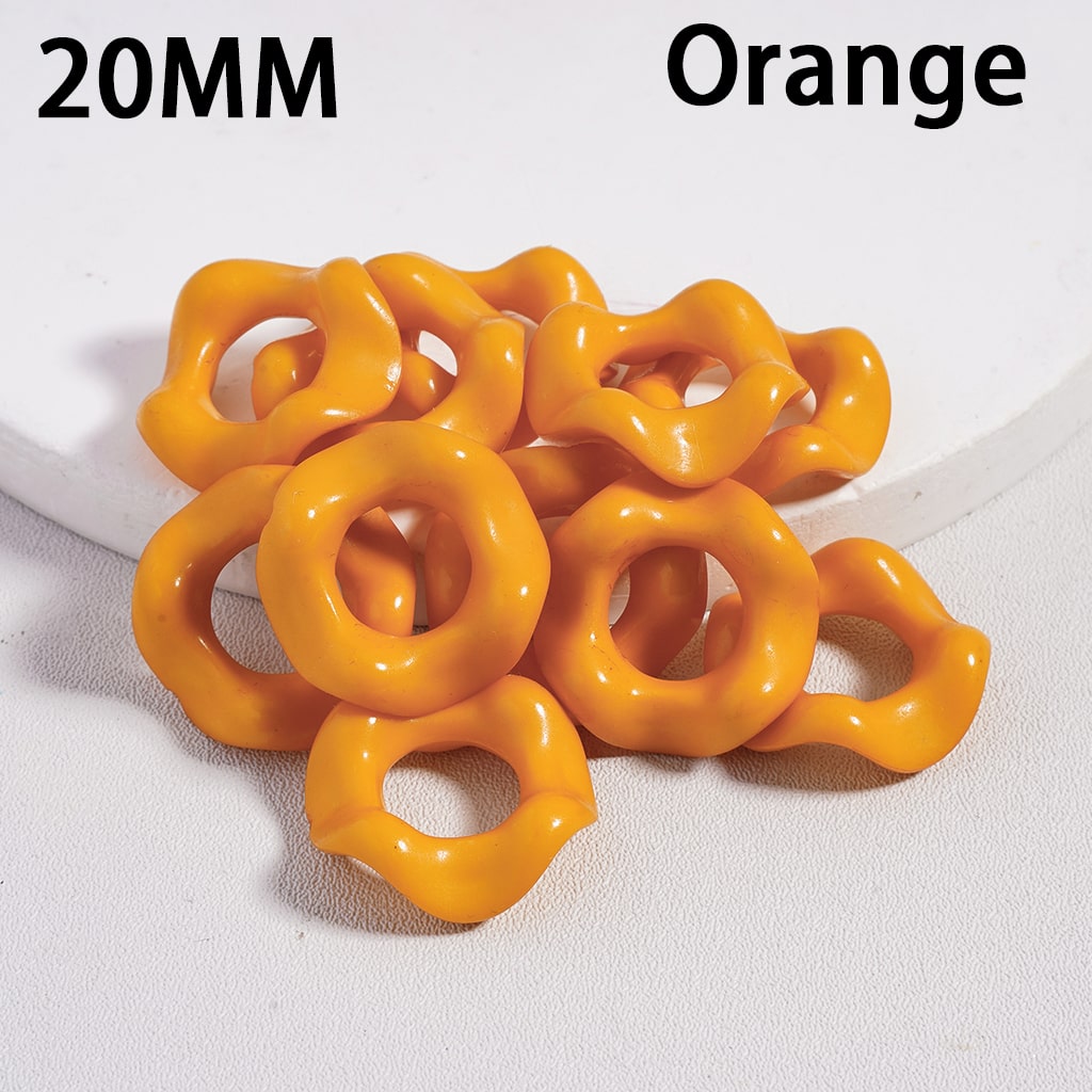 Orange plastic rings with '20MM' and 'Orange' text on a white background
