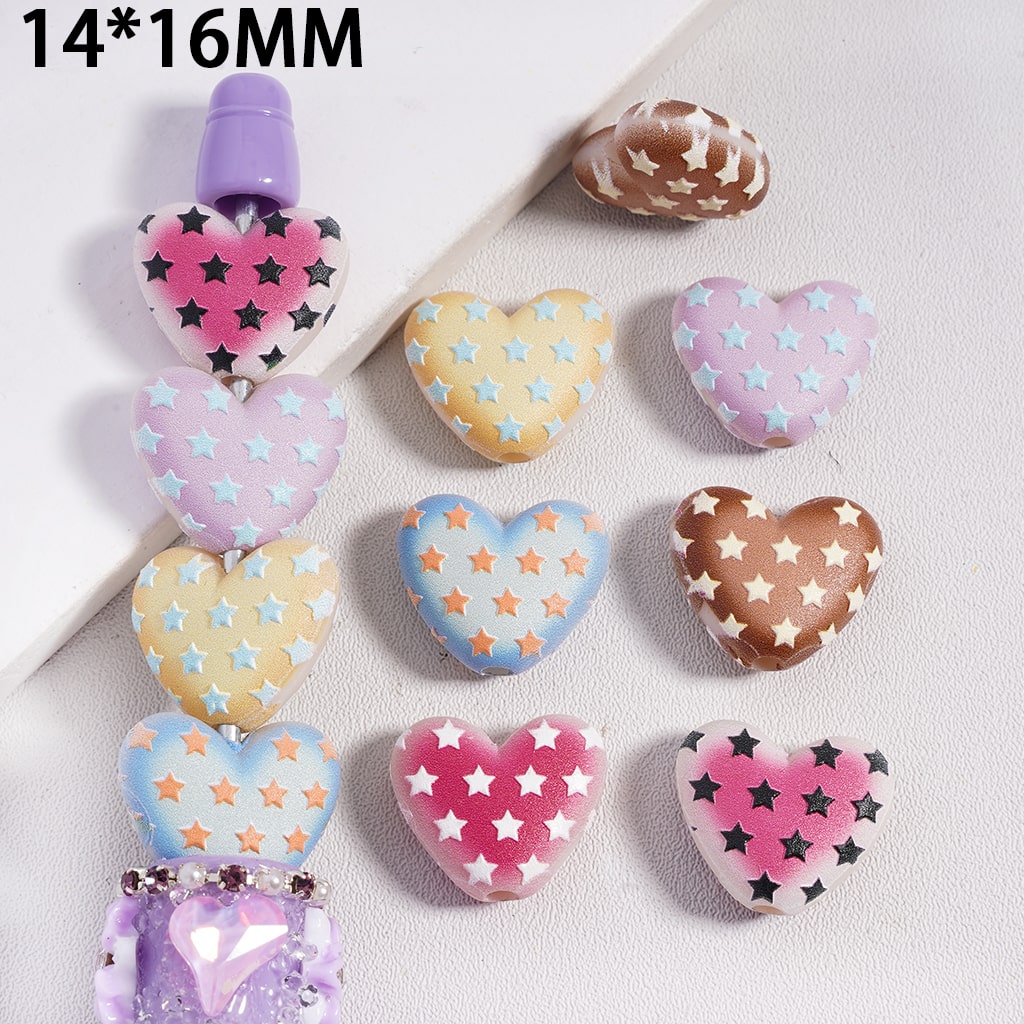 Heart-shaped decorative items with star patterns on a light background