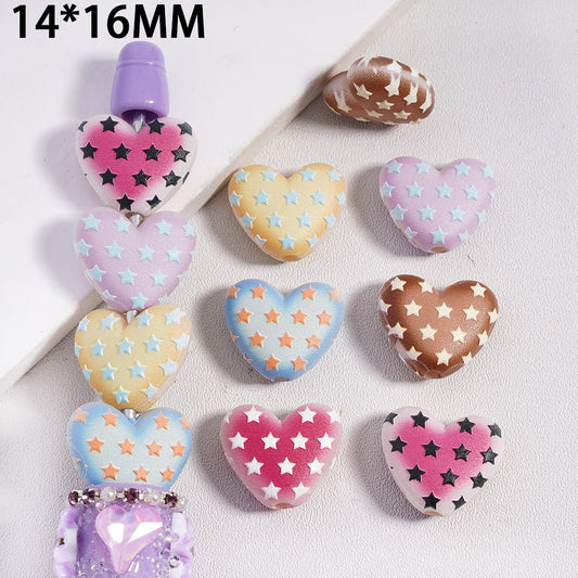 Heart-shaped decorative items with star patterns on a light background