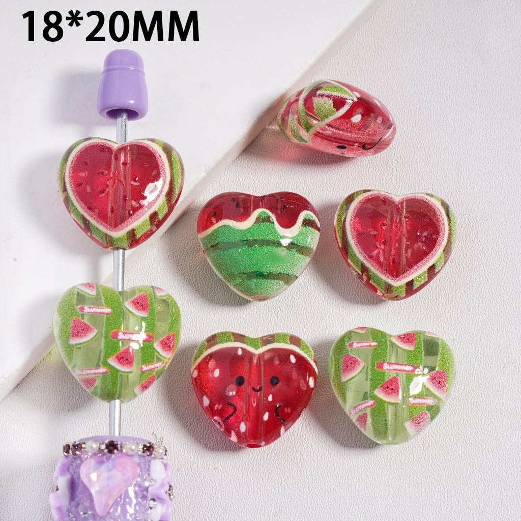 Heart-shaped watermelon design beads on a white background