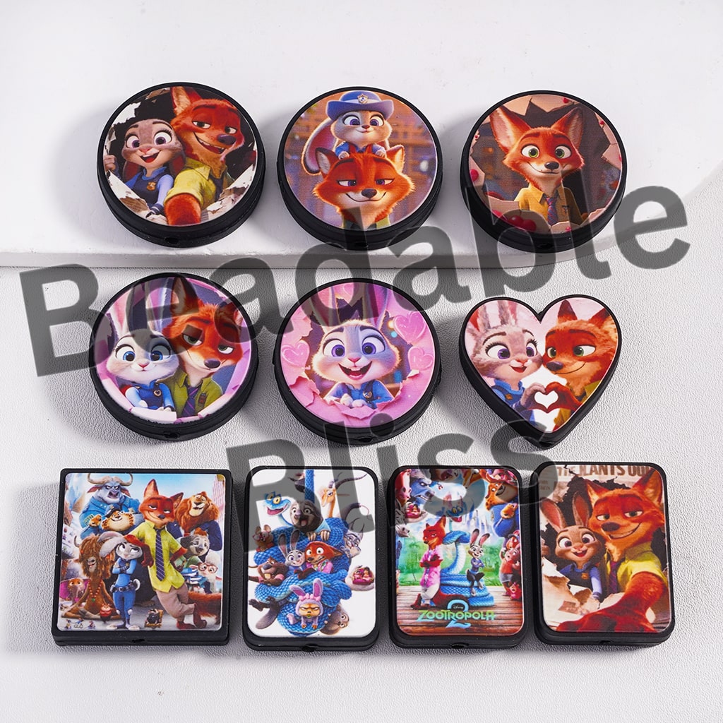 Set of cartoon character-themed coasters on a white surface.