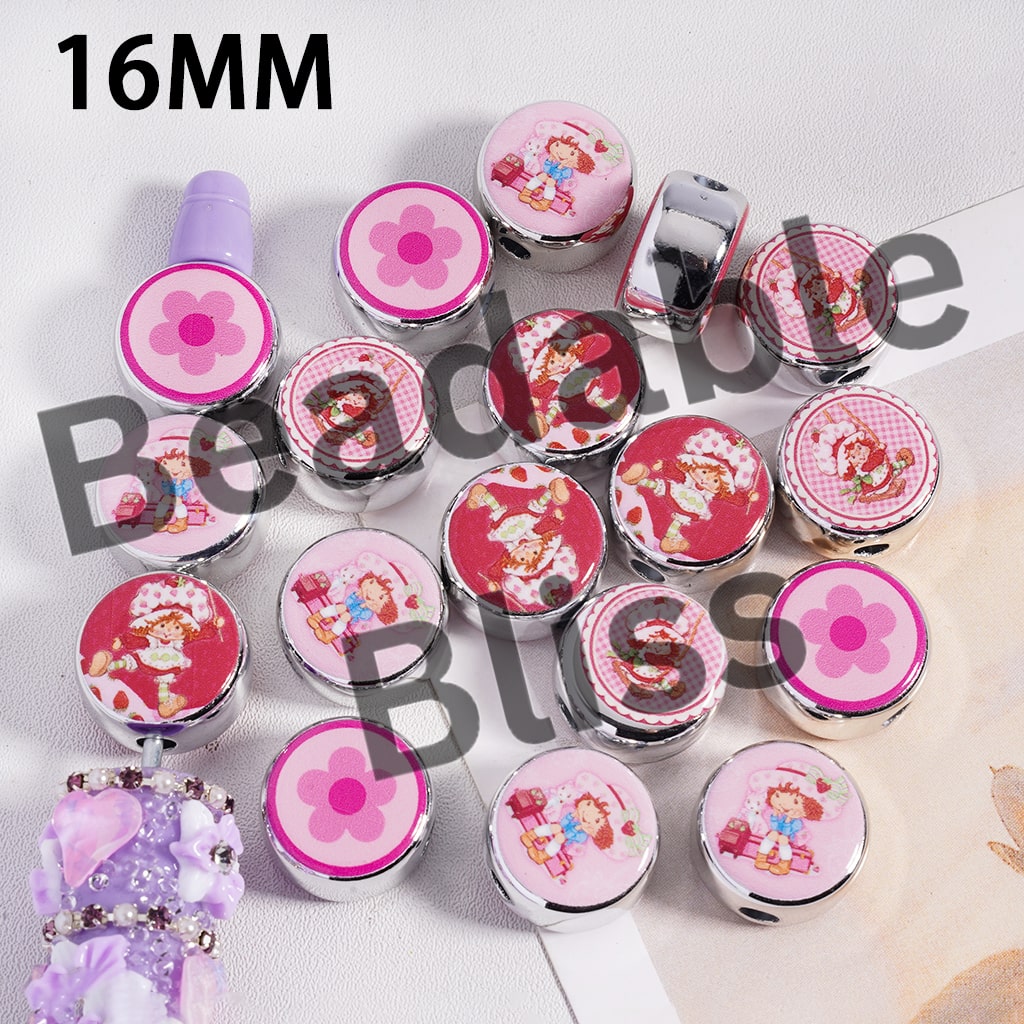 Collection of colorful buttons with cartoon designs on a white background