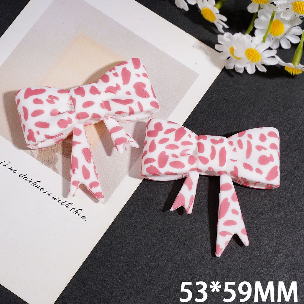 Silicone Focal Beads Soft Bowtie with Pink White Cow Spot Print, 53*59MM