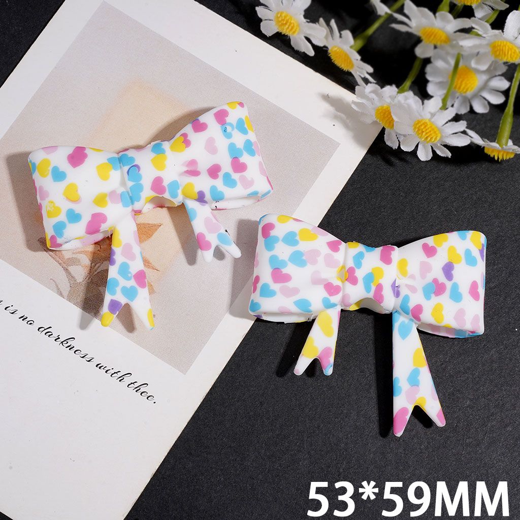Silicone Focal Beads Soft Bowtie with Multicolor Heart Print, 53*59MM