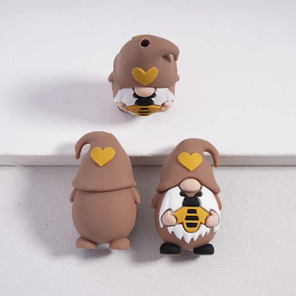 Three cartoon-style gnomes with heart-shaped eyes on a white background