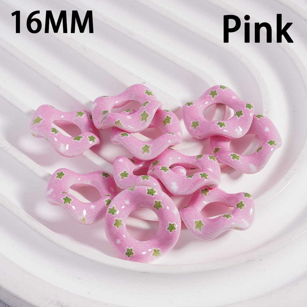 Pink beads with star patterns on a white background, labeled '16MM' and 'Pink'.