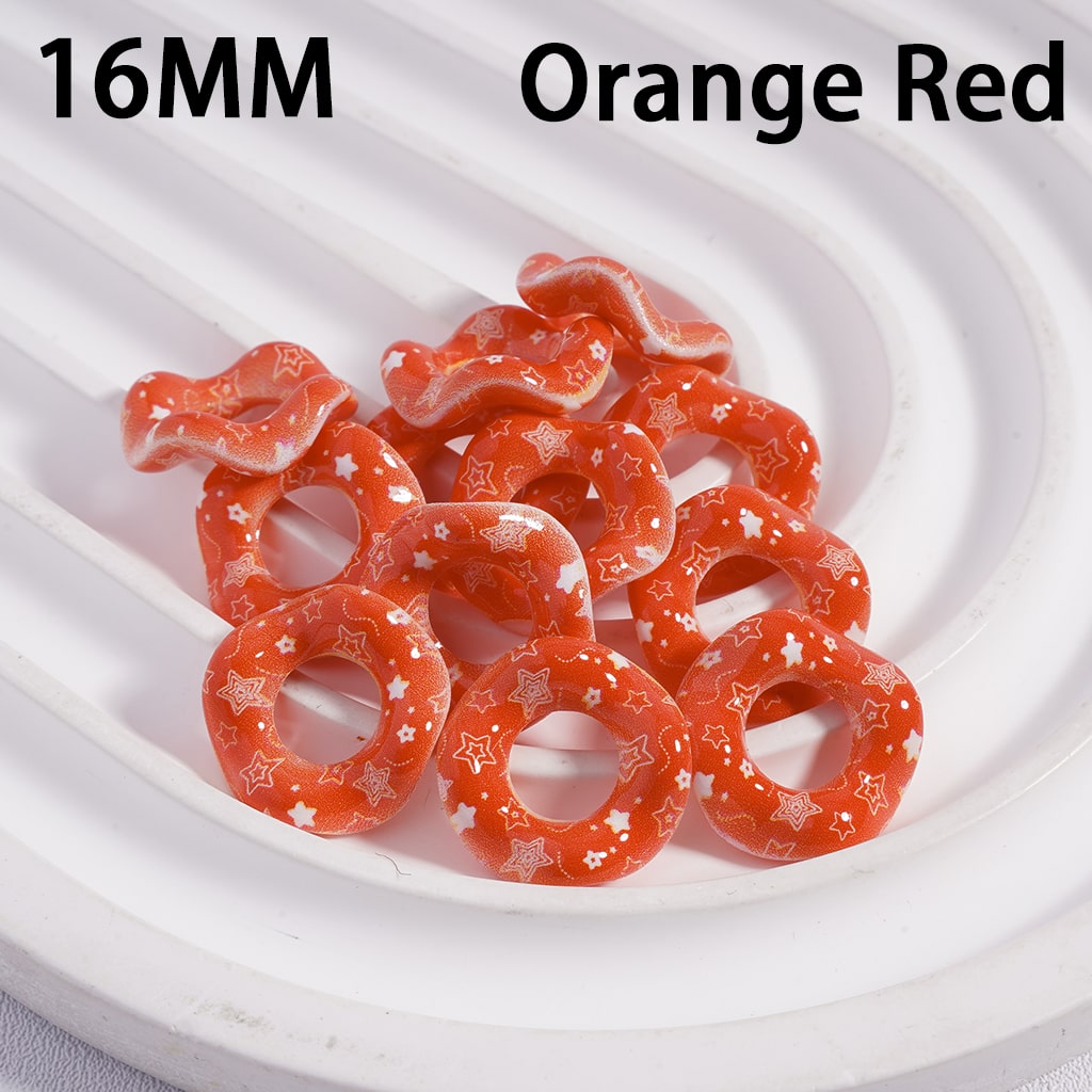 Orange red rubber bands with star patterns on a white background, labeled '16MM' and 'Orange Red'.
