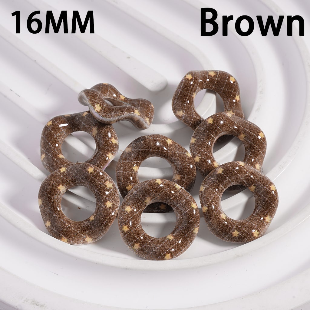 Brown pretzel-shaped candies on a white background with '16MM' and 'Brown' text.