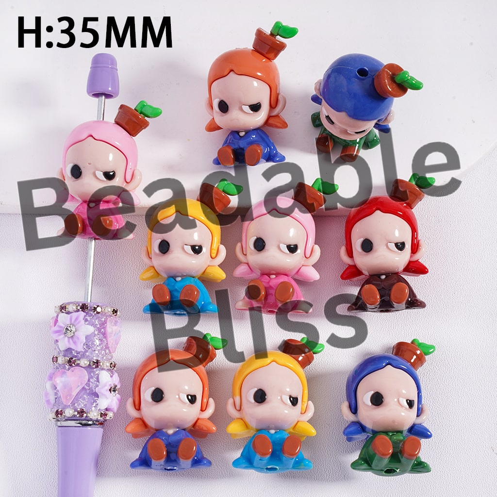 Set of colorful character figurines with a purple pen on a white background