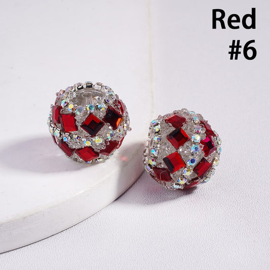 Red gemstone earrings on a white surface with 'Red #6' text.