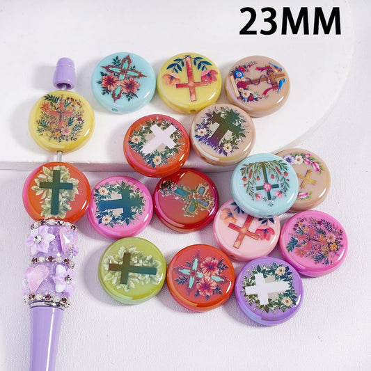 Colorful decorative buttons with floral and cross designs on a white background, with a 23MM label.