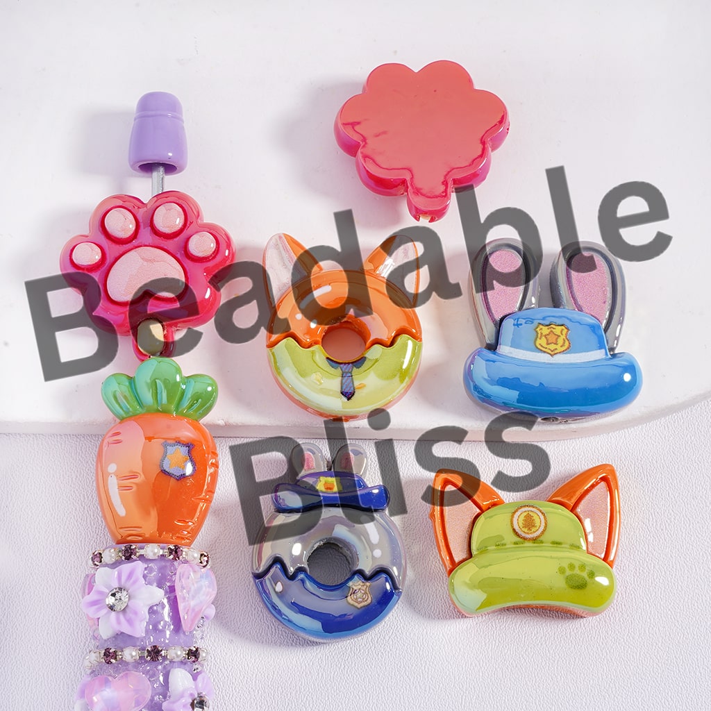 Colorful dog toys with animal designs on a white background