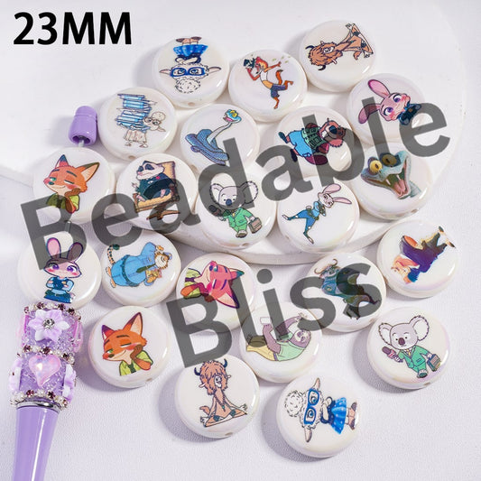 Set of colorful buttons with cartoon characters on a white background, with 'beadablebliss' branding.