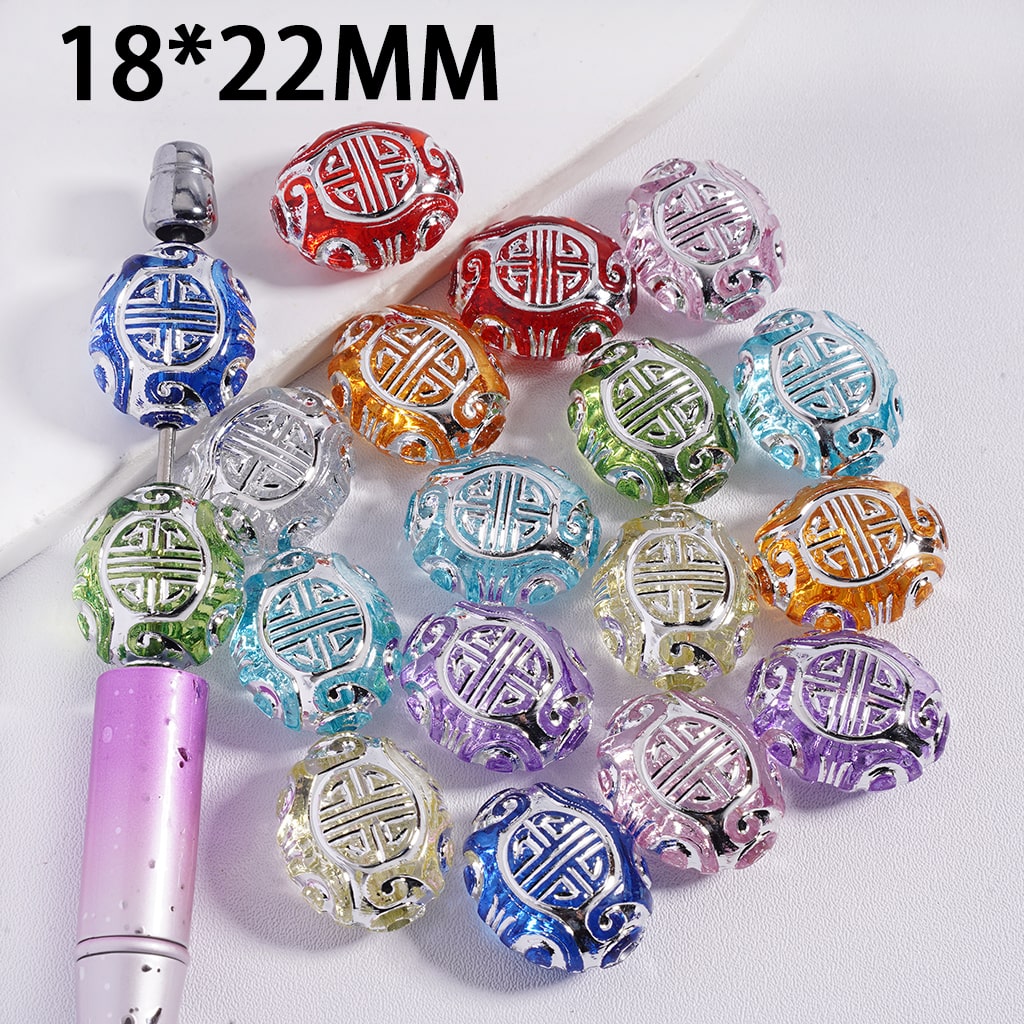 Assorted colorful beads with a central silver bead on a white background