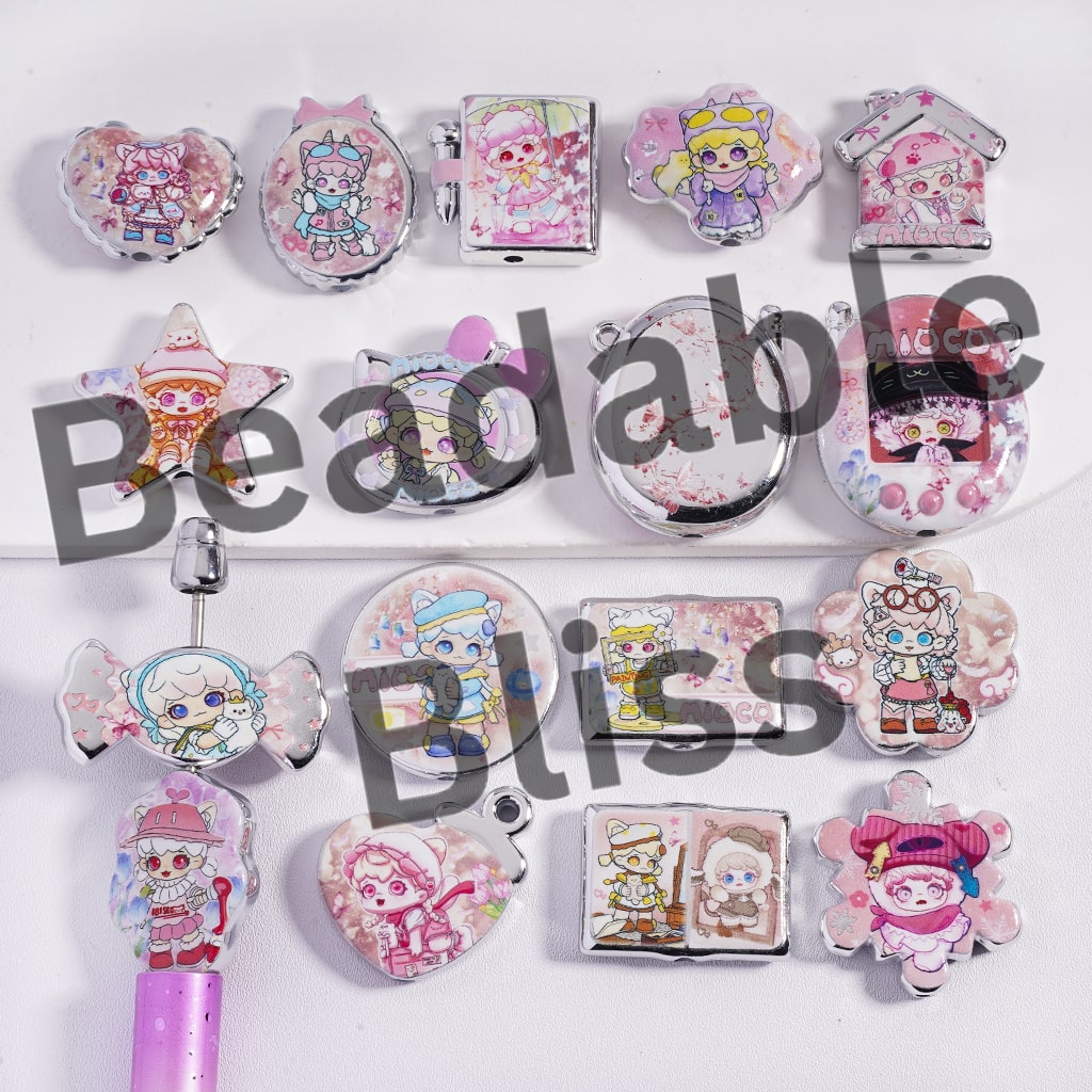Collection of colorful character-themed keychains and charms on a white background with 'beadablebliss' branding.