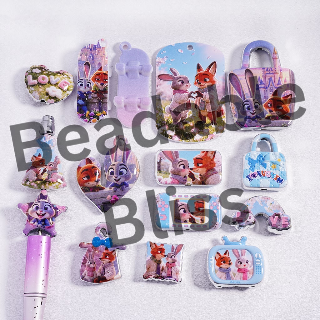 Collection of cartoon-themed stationery items on a white background with 'beadablebliss' branding.