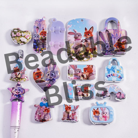 Collection of cartoon-themed stationery items on a white background with 'beadablebliss' branding.