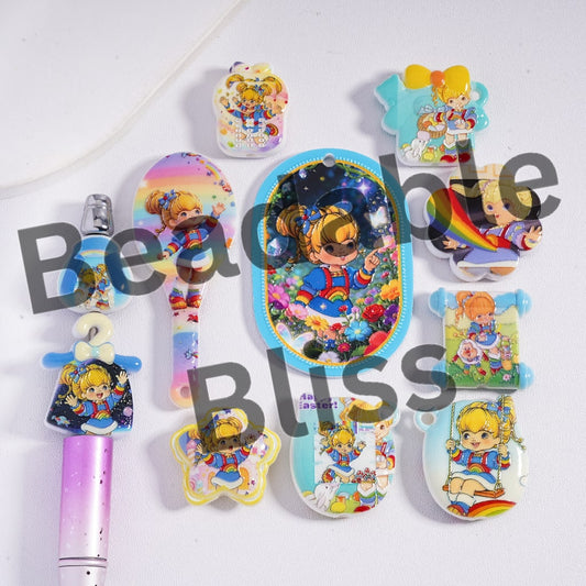 Set of colorful stationery items with cartoon character design on a white background