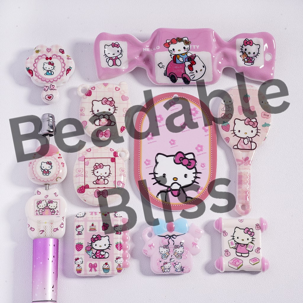 Collection of Hello Kitty-themed stationery items on a white background