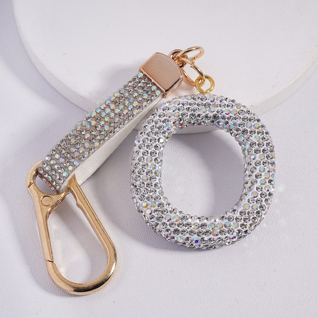 Keychain with rhinestone embellishments on a light background