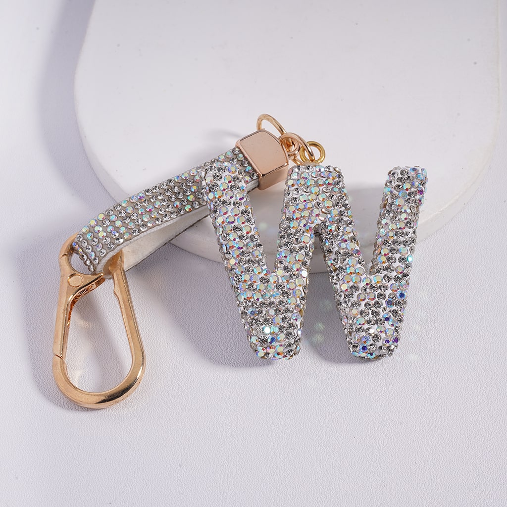 Keychain with letter 'W' made of rhinestones on a light background