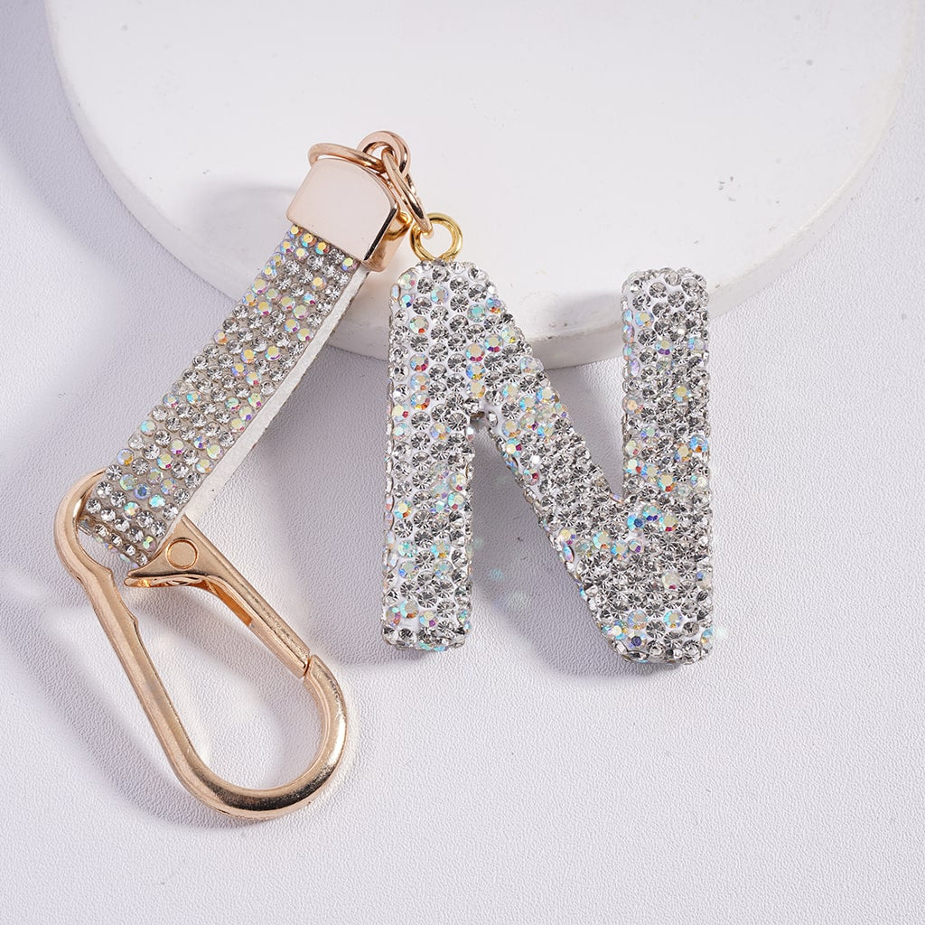 Keychain with letter 'N' made of sparkling crystals on a white background