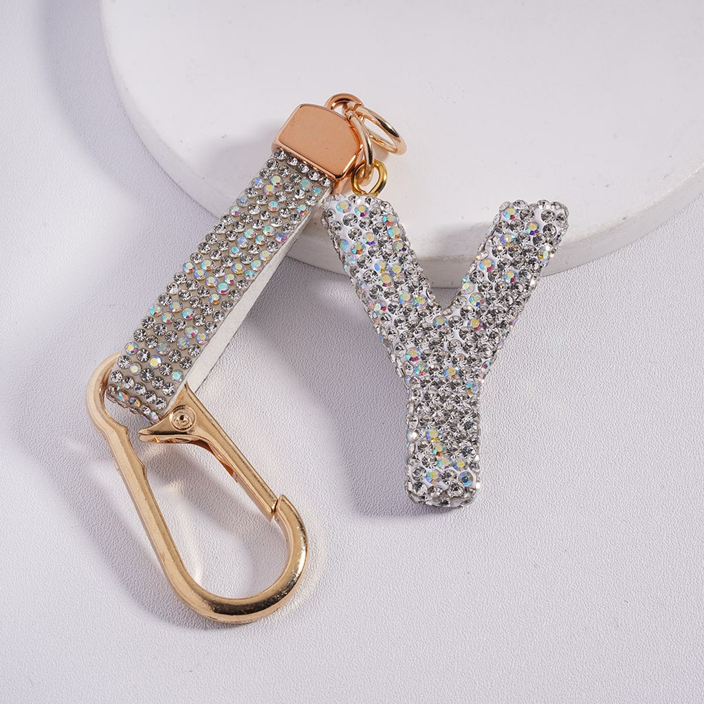 Keychain with 'Y' letter and gold carabiner on a white background