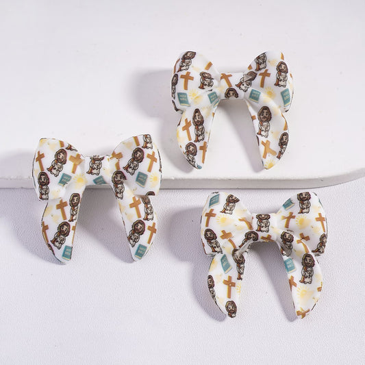 Three decorative bows with a pattern of dogs on a white background