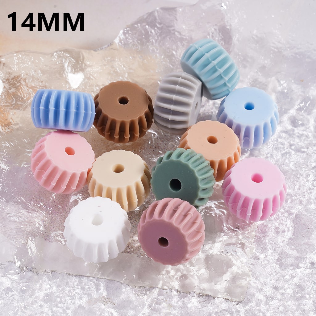 Pastel-colored plastic gears on a textured white background with '14MM' text.