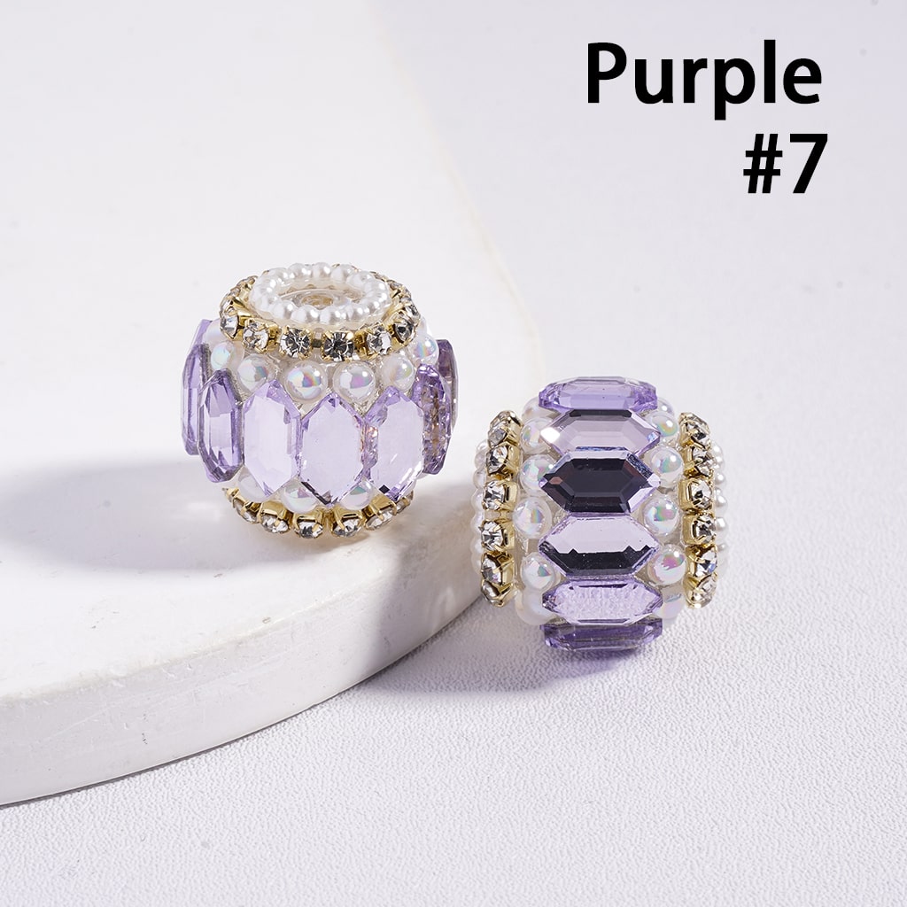 Two purple beaded charms with gold accents on a white surface, labeled 'Purple #7'.