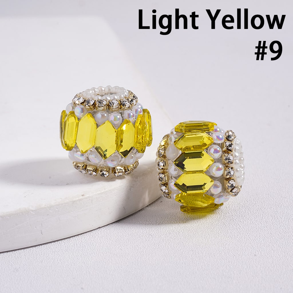 Two yellow beaded earrings on a white surface with 'Light Yellow #9' text.