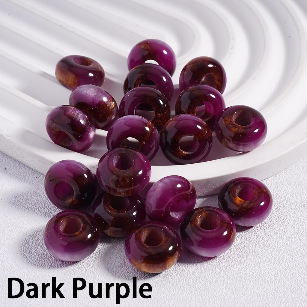 Dark purple beads on a white background