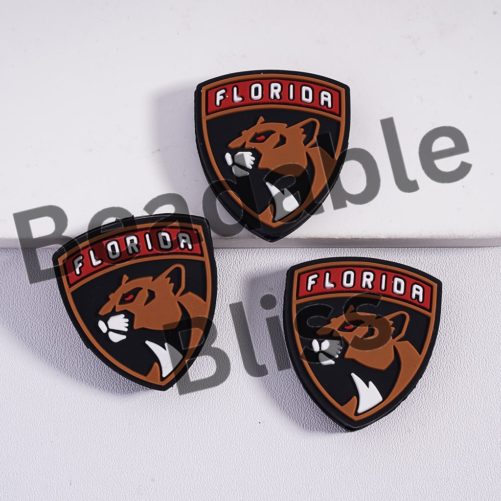 Three 'Florida' themed patches with a panther design on a white background.