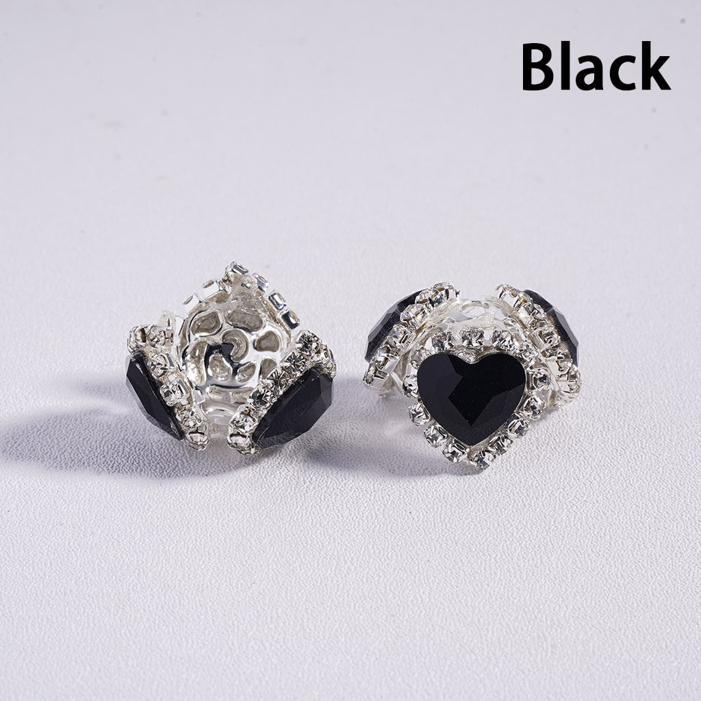 Black and silver earrings on a white background with 'Black' text.