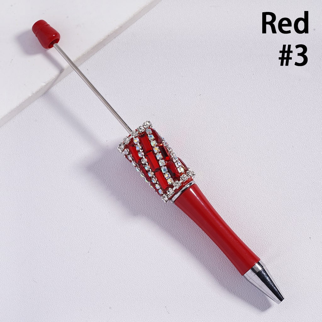 Red pen with decorative elements on a white background