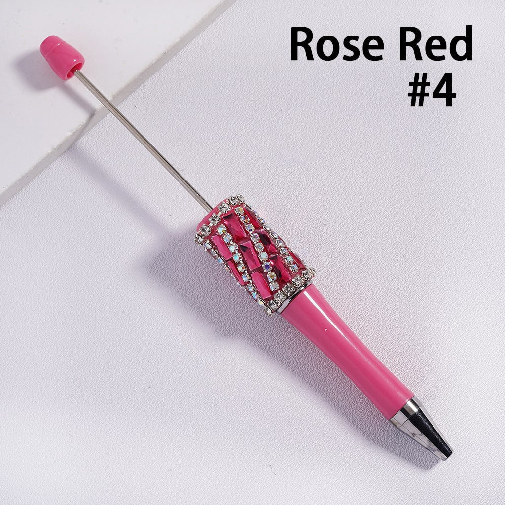 Pink pen with decorative elements on a white background