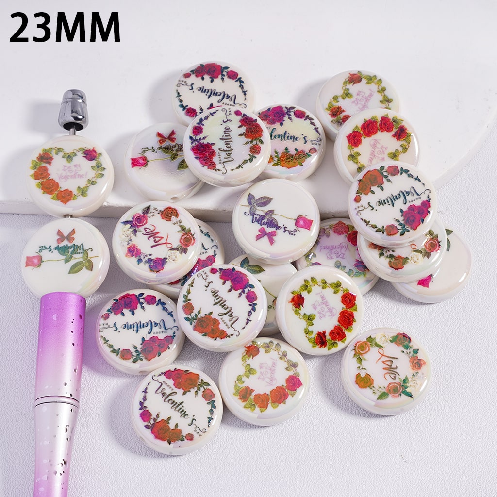 Decorative buttons with floral designs and text on a white background