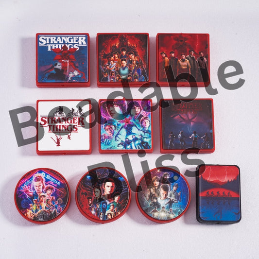 Collection of 'Stranger Things' themed coasters on a white background