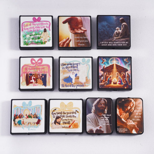 Set of small religious-themed cards on a white background