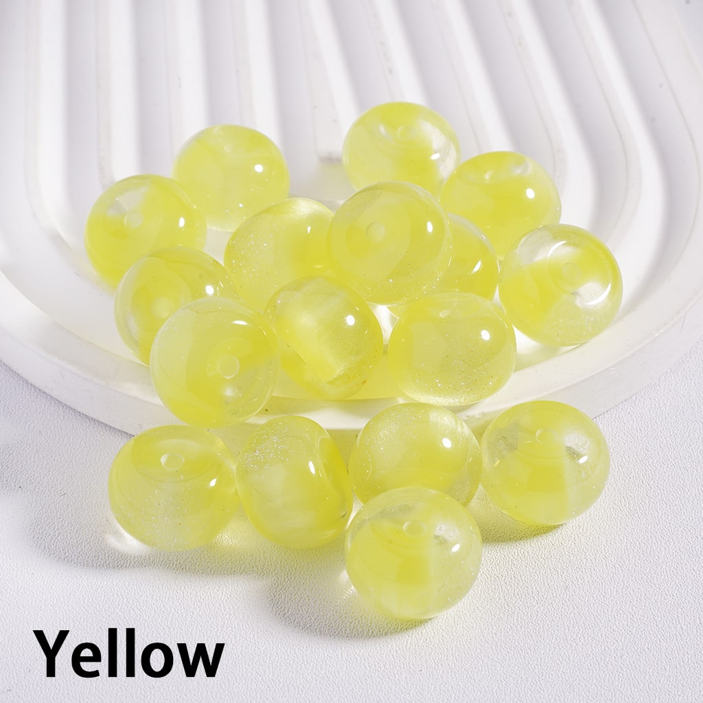 Yellow beads on a white background with 'Yellow' text below.