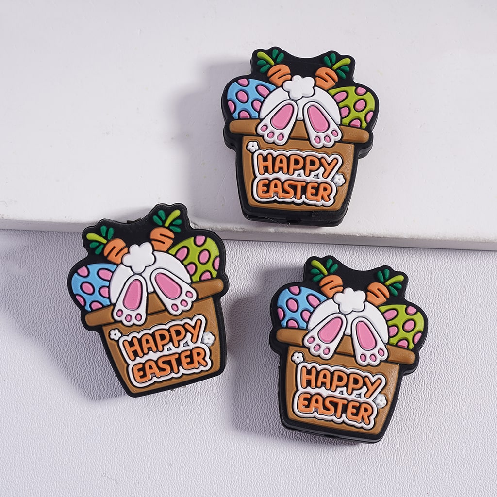 Three 'Happy Easter' themed pins with decorative elements on a white background