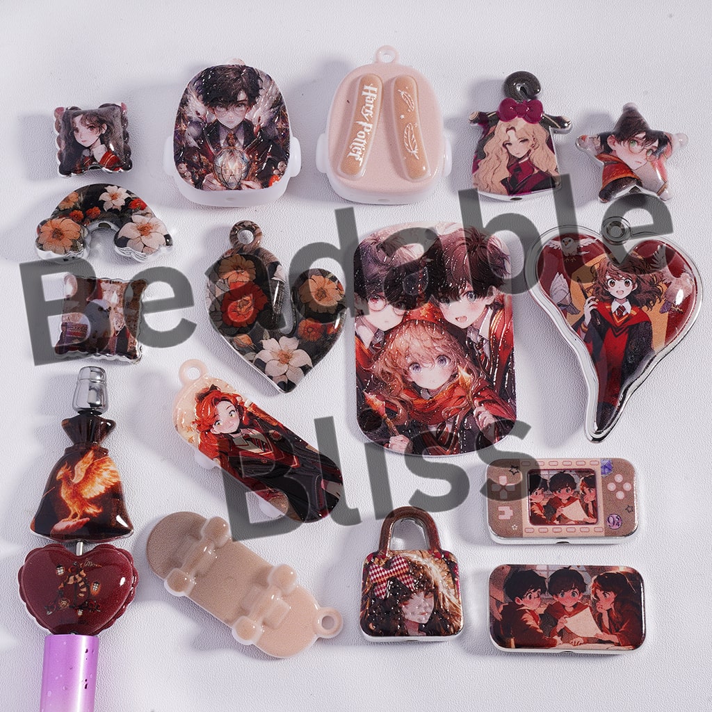 Collection of various small decorative items with printed designs on a white background.