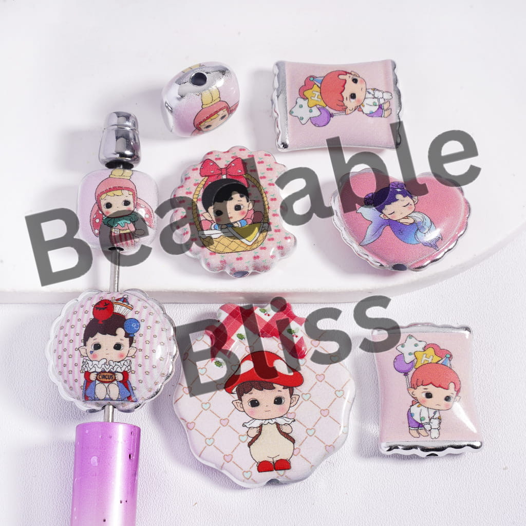 Set of cartoon-themed badge reels and clips on a white background
