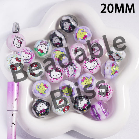 Collection of Hello Kitty-themed beads on a white heart-shaped tray.