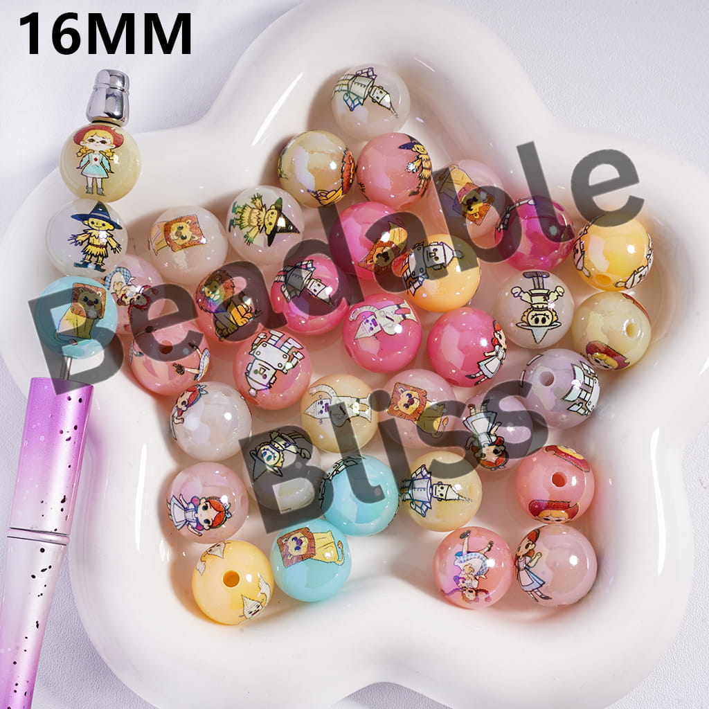 Colorful beaded necklace with cartoon characters on a white dish, with a pink tool next to it.