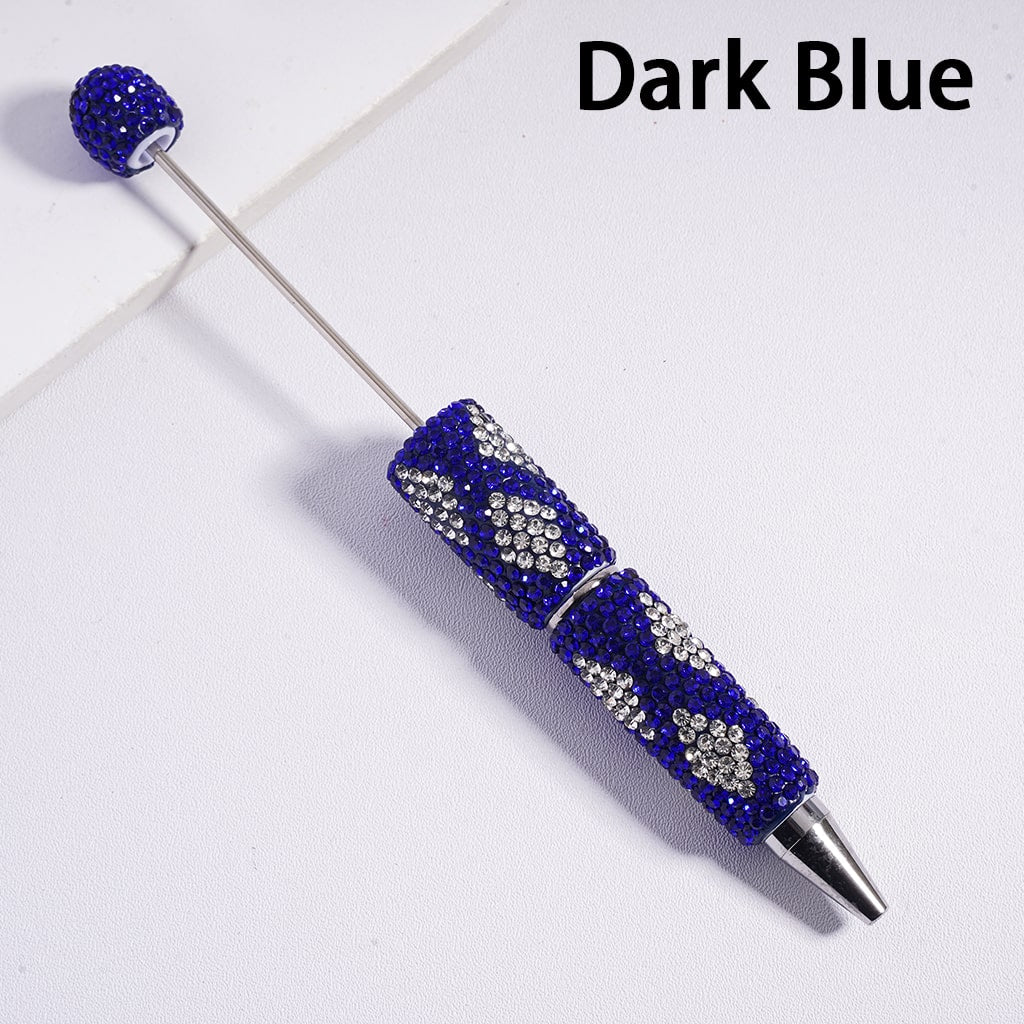 Dark blue pen with decorative elements on a white background
